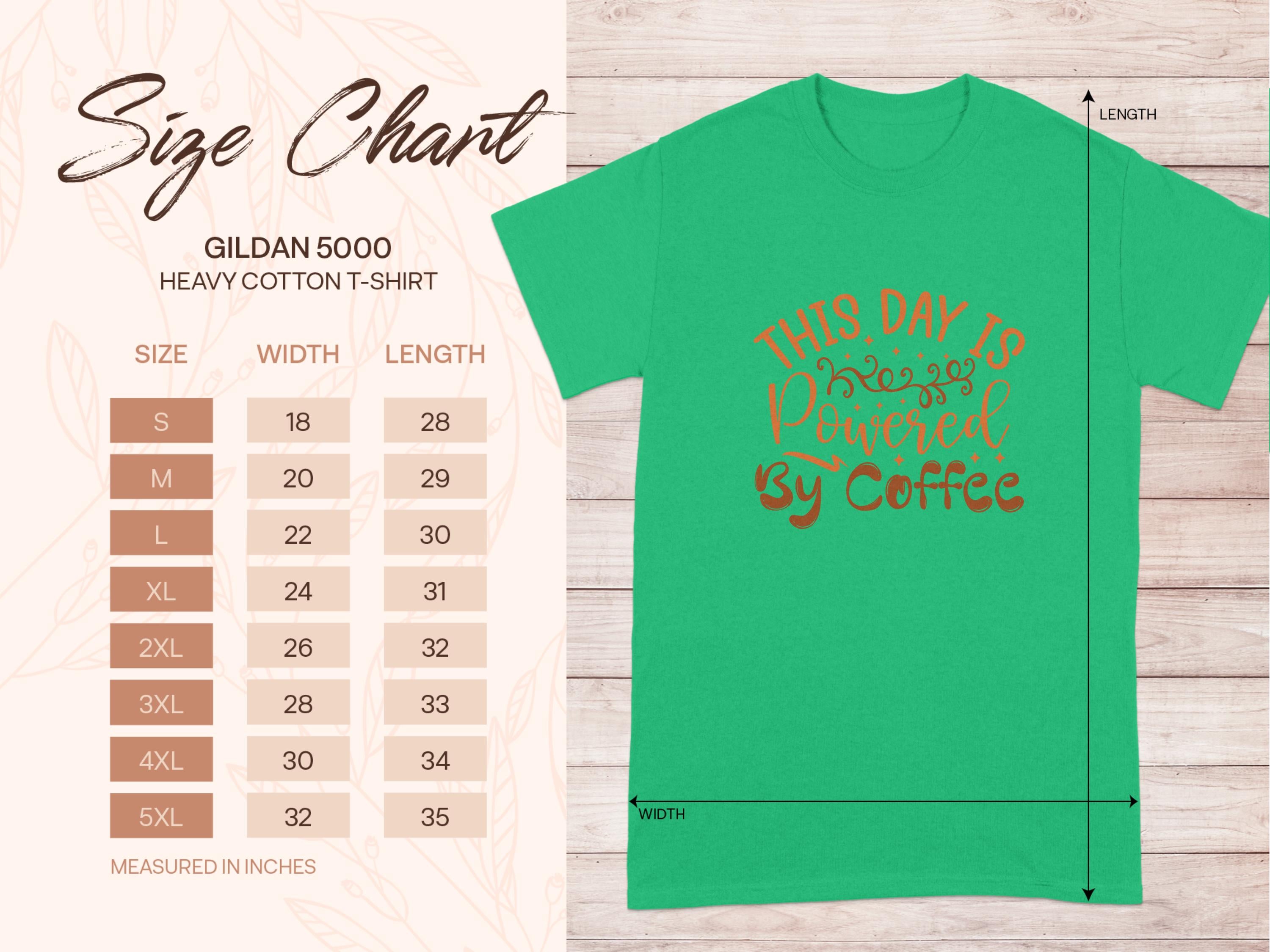 A green Garment Graphics heavy cotton T-shirt, classic fit, with This Day Is Powered by Coffee in orange. Ideal for coffee lovers, it includes a size chart from S to 5XL on the left, detailing width and length for the best fit.