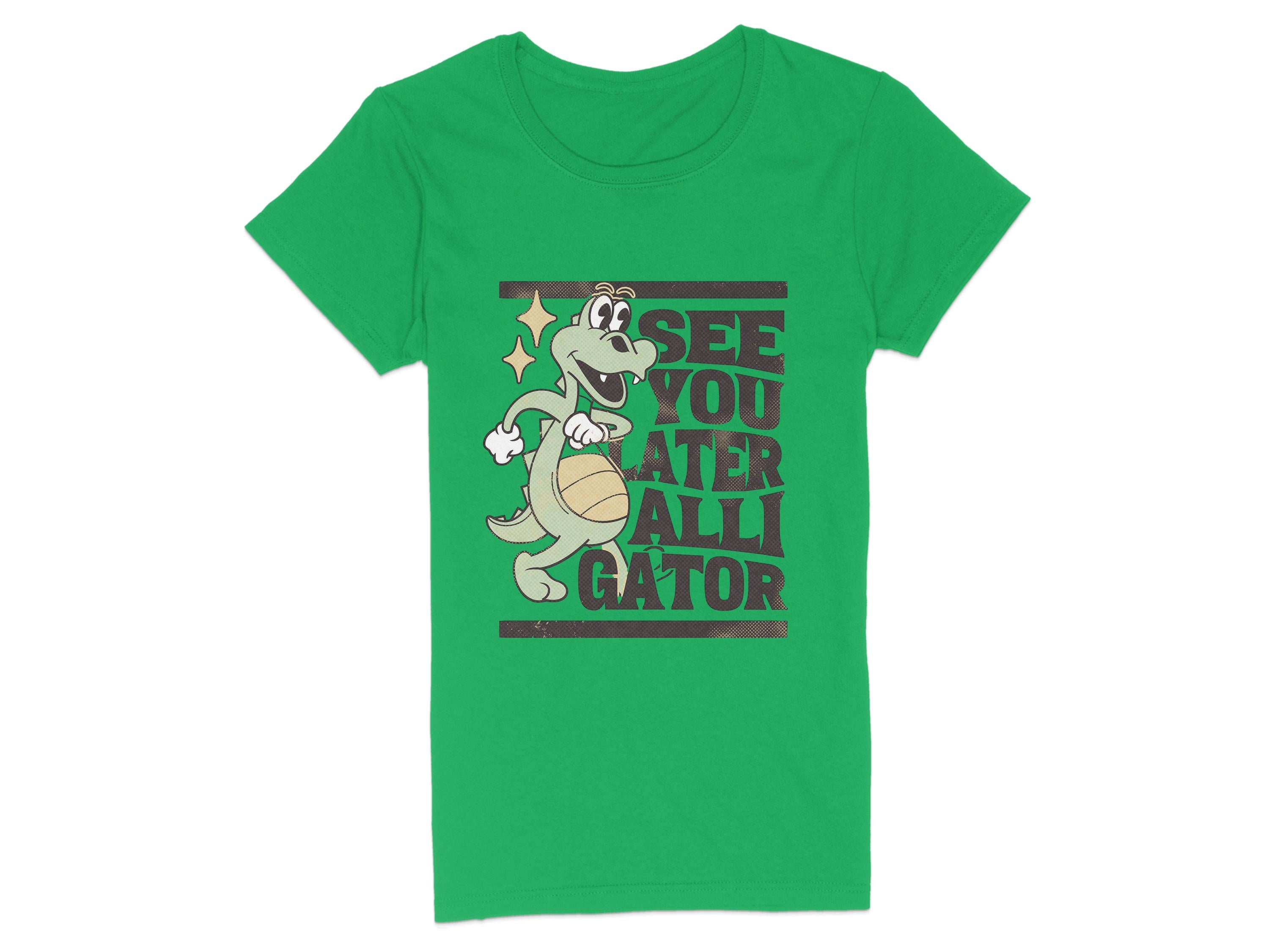 Garment Graphics womens green t-shirt features a funny cartoon alligator holding a volleyball with the phrase See You Later Alligator.