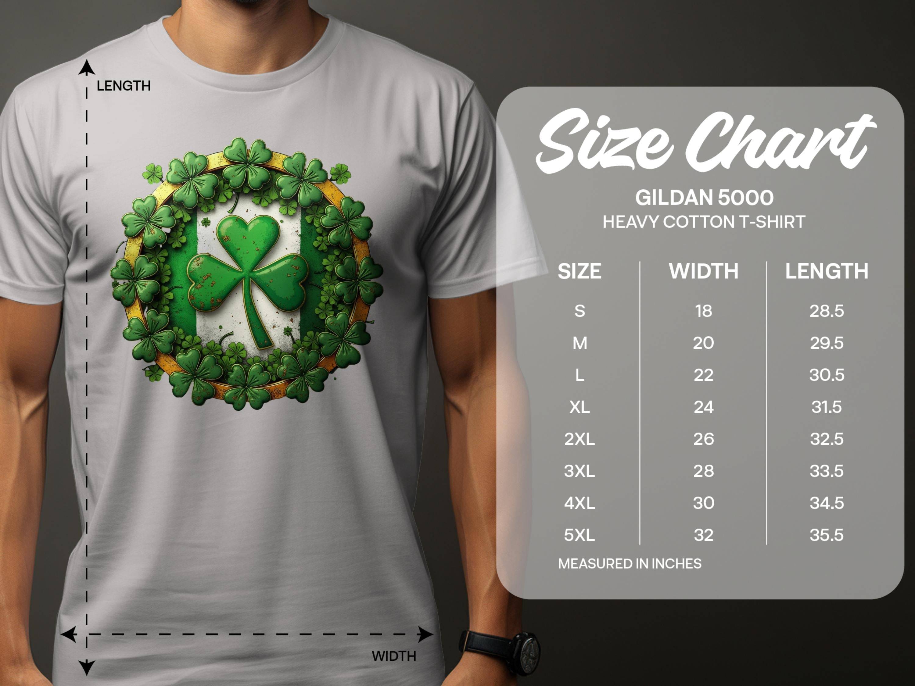 A person is wearing a Garment Graphics white graphic T-shirt featuring a green shamrock surrounded by clovers, ideal for St Patricks Day. Nearby, theres a size chart for the Gildan 5000 heavy cotton tee, detailing sizes S to 5XL with widths and lengths in inches.