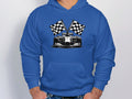 A man wears a blue hoodie from Garment Graphics featuring a dynamic racing theme with a vibrant race car design and crossed black and white checkered flags.