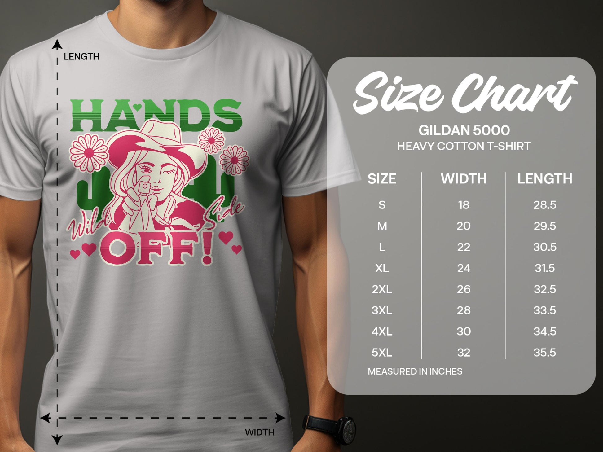 A person wears a Garment Graphics Hands Off T-Shirt with a bold design: a cowboy hat icon holding a flower among blooms and HANDS OFF! text. The classic fit, based on the Gildan 5000 heavy cotton size chart, offers sizes S to 5XL with precise measurements.