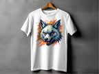 A stylish Garment Graphics T-shirt hangs on a wooden hanger, featuring a vivid wolf graphic against an abstract orange splash. Ideal for fearless personalities, it pops beautifully against the gray wall backdrop.