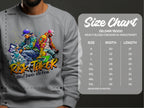 A person wears a gray Garment Graphics sweatshirt showcasing vibrant street dance graphics with Risk Taker Street Dance 10th Final. To the right is a size chart for the unisex-sized Gildan 18000 sweatshirt, listing sizes S to 5XL with measurements in inches.