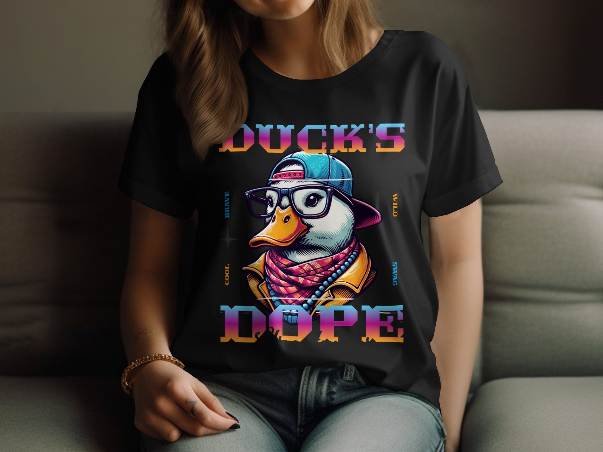 A person lounges on a sofa wearing a black T-shirt featuring a vibrant illustration of a duck in a cap, glasses, and jacket. With DUCKS DOPE emblazoned on it, this unique design embodies the cool swag of Dope T-Shirts by Garment Graphics.