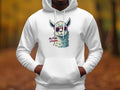 A person wears a classic-fit white llama hoodie from Garment Graphics, featuring a humorous graphic of a llama in sunglasses and the phrase No Prob-llama, set against an outdoor autumn scene with vibrant fall leaves softly blurred in the background.