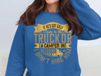 A person wears a blue sweatshirt from Garment Graphics featuring a funny graphic: If hes got golf clubs in his truck or a camper in his driveway, I dont hire him, with a golf cart design.