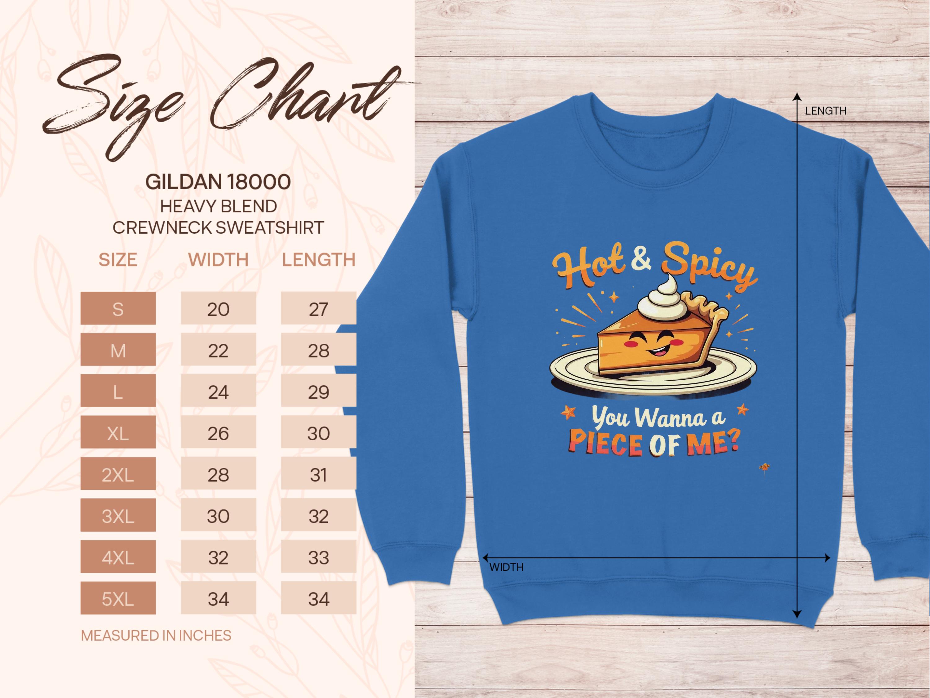 A size chart for Garment Graphics Gildan 18000 Heavy Blend Crewneck Sweatshirt, unisex sizes S-5XL with widths and lengths, is on the left. On the right, a blue sweatshirt features a playful pie character and text: Hot & Spicy. You Wanna a Piece of Me?.