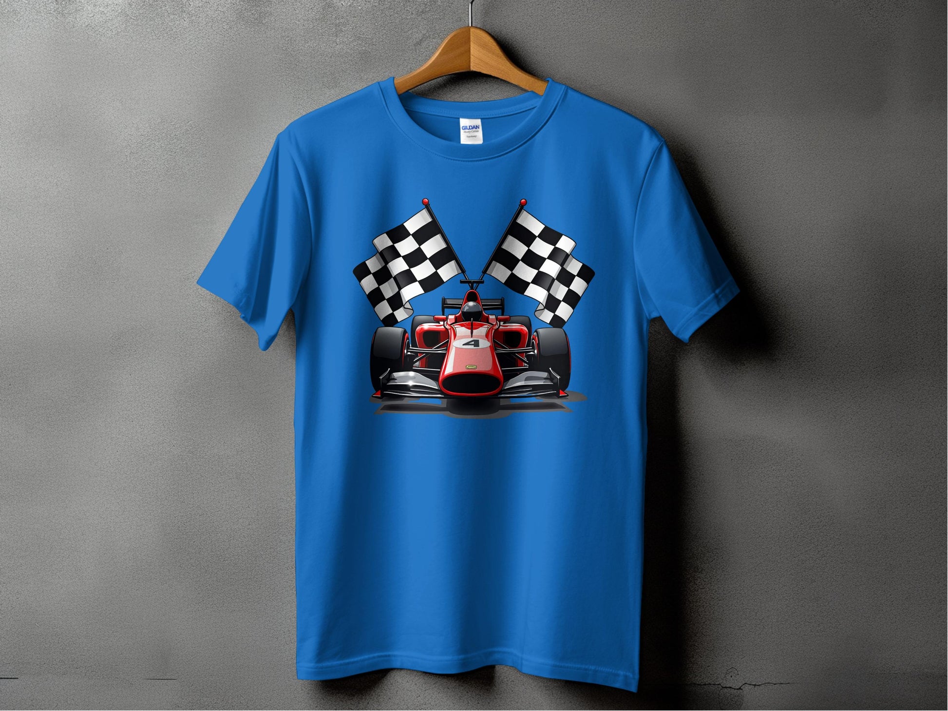 Designed for motorsport enthusiasts, Garment Graphics presents a stylish T-shirt featuring a red race car with two black and white checkered flags against a sleek gray background. The blue fabric is elegantly displayed on a wooden hanger, making it perfect for any fan.