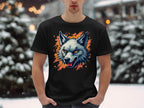 A person outdoors in a snowy setting wears a stylish Garment Graphics T-shirt, featuring a colorful wolf graphic with orange accents. Snow-covered trees and subtle lights complete the scene, showcasing fearless personality.