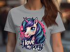 A unicorn enthusiast sports a Garment Graphics I Love My Pony T-shirt, showcasing a whimsical unicorn with a vibrant purple and blue mane, adorned with a horn and surrounded by stars and musical notes, capturing the magic of these beloved creatures.