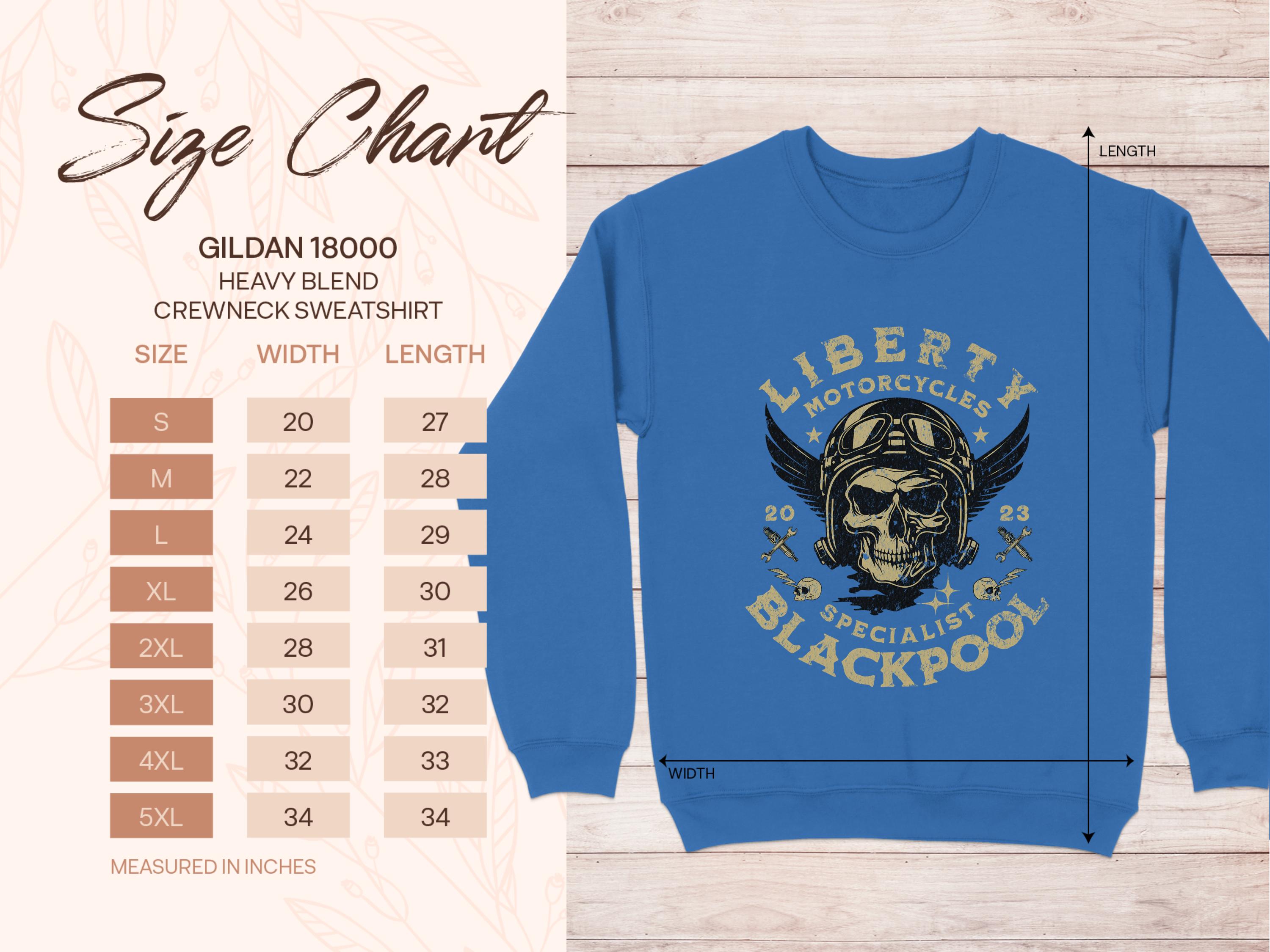 Garment Graphics offers a blue crewneck sweatshirt with a skull and motorcycle helmet graphic labeled Liberty Motorcycles Specialist Blackpool 2023. Available in sizes S to 5XL, it includes a size chart detailing precise width and length measurements.