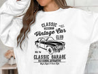 A person wears a Garment Graphics white sweatshirt featuring a vintage car design. It showcases Classic London City Vintage Car Club, Automotive Style, and declares Custom Classic and Classic Garage Old School Automotive for high style & a cool lifestyle.