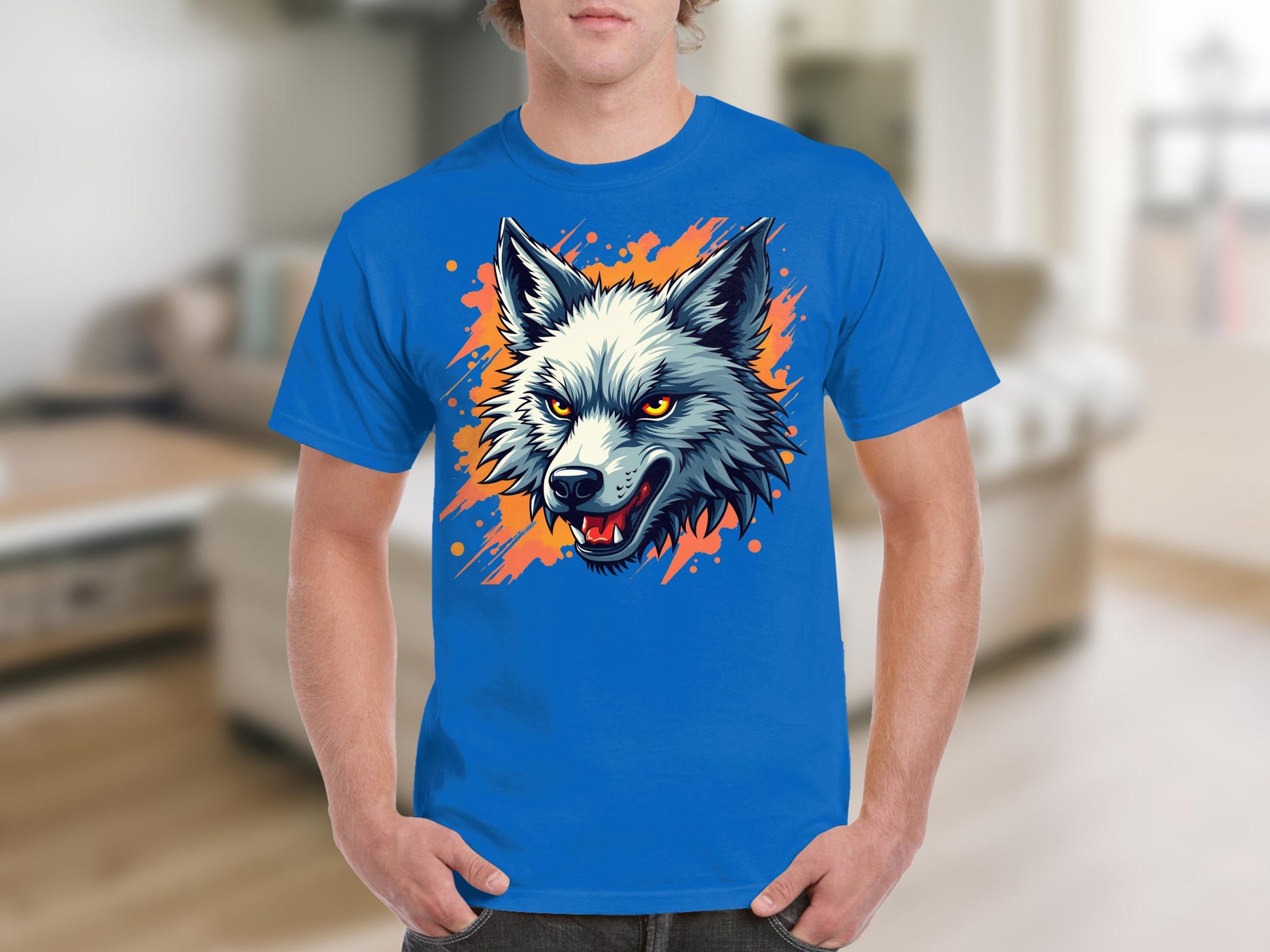 Garment Graphics blue T-shirt showcases a bold wolf graphic with intense eyes and bared teeth juxtaposed against an orange splash, making it stand out even in the blurred room setting.