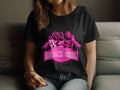 A person wears a black t-shirt with a pink graphic featuring three women with long hair and palm trees. Bold text reads Always Party Beach Girl Kittl Apparel, capturing the vibrant spirit of Beach Girl T-Shirts by Garment Graphics.