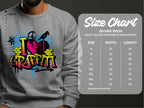 A gray Garment Graphics sweatshirt features vibrant I Love Graffiti street art with a pink heart and spray paint motifs. The accompanying size chart for the Gildan 18000 lists sizes S to 5XL with corresponding width and length in inches.