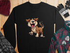 Garment Graphics presents a black sweatshirt featuring an animated happy dog with its tongue out, displayed on wood. Ideal for dog lovers, it’s paired with a red knit hat, gloves, plaid shirt, and checkered scarf.