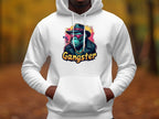A person sports a smokey cool style in a white Garment Graphics hoodie, featuring a gangster gorilla with sunglasses, hat, and gold chain. Gangster is displayed beneath this medium-heavy hoodie against a blurred outdoor backdrop.