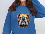 A person with long brown hair wears a Garment Graphics blue unisex sweatshirt featuring a bulldog with a spiked collar graphic. Their face is hidden.
