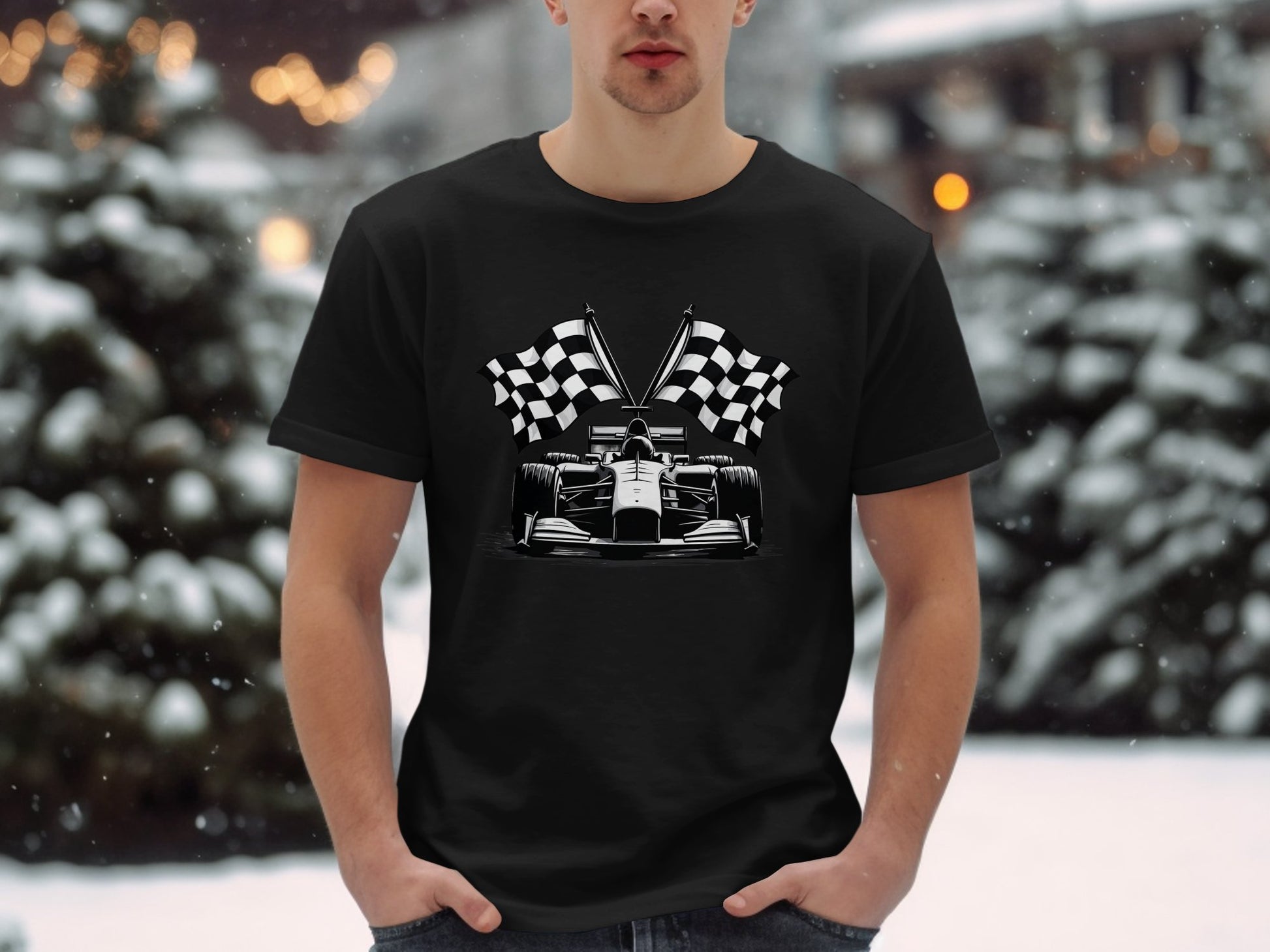In a snowy landscape with frosty trees, an individual wears a Garment Graphics black T-shirt featuring a sleek Formula One racing car and checkered flags.
