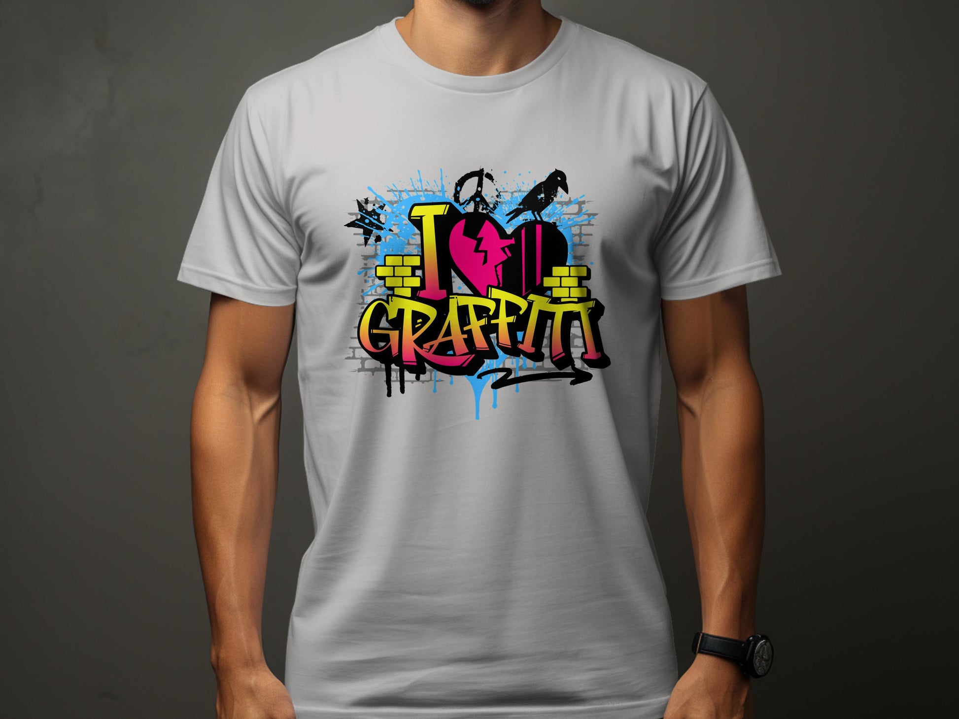 A person wears a Garment Graphics light gray t-shirt with vibrant graffiti, featuring I Love Graffiti, a silhouette of someone with a spray can, abstract splashes, and a heart shape—embodying Graffiti Love T-Shirts.