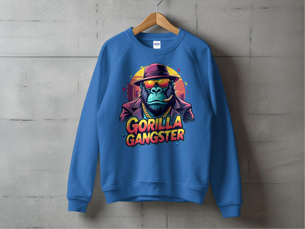 Urban style meets playful flair with Garment Graphics blue sweatshirt. Featuring a gorilla in sunglasses, hat, and chain necklace, it boldly displays Gorilla Gangster. Ideal for those who embrace stylish sweatshirts with attitude, this piece hangs against a concrete wall backdrop.