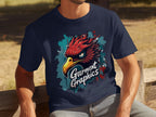 A person in a classic fit Garment Graphics navy T-shirt featuring an eagle design relaxes on a wooden bench outdoors, with grass and shaded areas in the background.