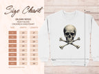 The size chart for Garment Graphics Gildan 18000 heavy blend crewneck sweatshirt, a bold choice, shows sizes S to 5XL with width and length in inches. A white graphic print sweatshirt features an iconic skull and crossbones. Measurements are clearly illustrated.
