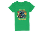 Garment Graphics presents a green t-shirt featuring a vibrant truck graphic driving forward. Bold orange letters spell Keep On Trucking above and below, making it a must-have for trucking enthusiasts.