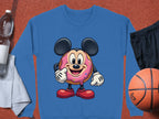 The Garment Graphics sweatshirt showcases a cute cartoon donut with large round ears, red shoes, and white gloves. Paired with a basketball, black shorts, water bottle, and gray towel, it adds a playful touch to any wardrobe.
