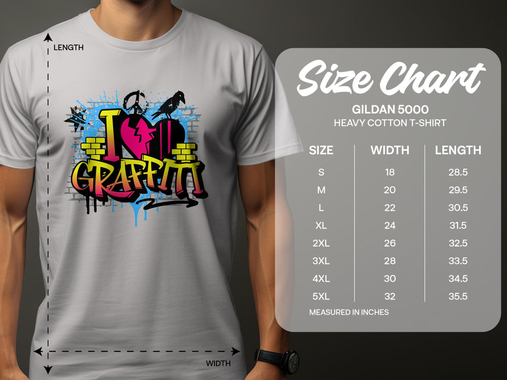 A person sports a gray tee featuring a vibrant I Love Graffiti street art design with paint splatters and bricks. A size chart for Garment Graphics T-Shirts by Gildan 5000 is shown, listing sizes S to 5XL with measurements in inches.
