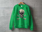 A Garment Graphics green sweatshirt featuring an edgy skull and crossbones design hangs on a wooden hanger against a textured gray wall.