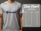 A person wearing a Garment Graphics Scania logo t-shirt stands beside a size chart for the Gildan 5000 Heavy Cotton T-Shirt, displaying sizes from S to 5XL with width and length measurements in inches.