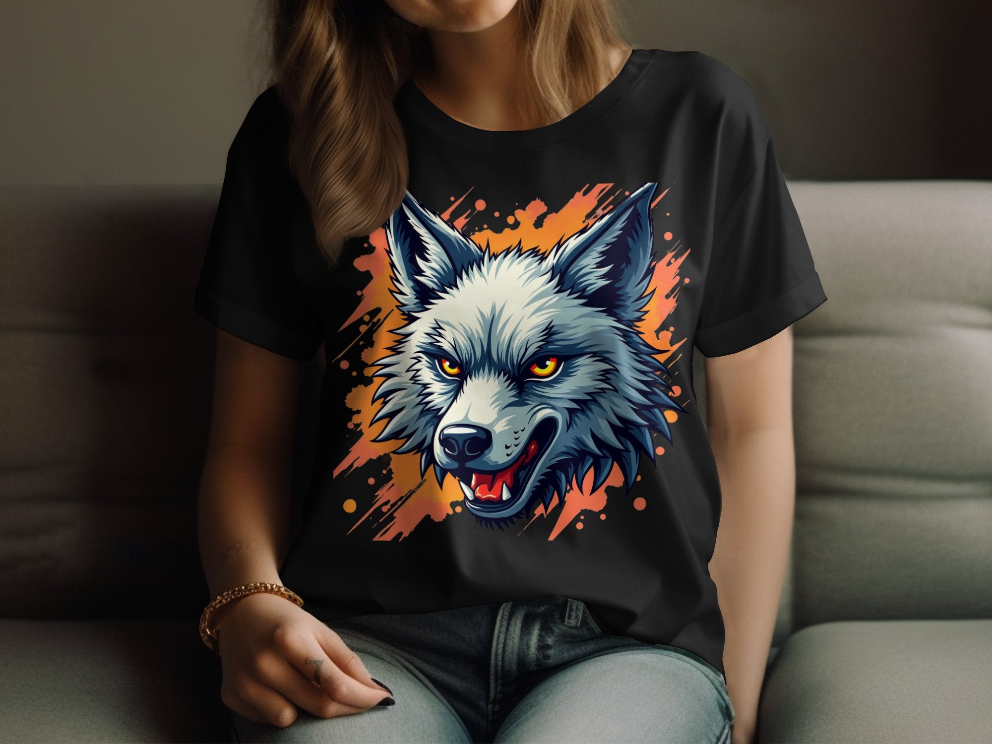 On the sofa, someone exudes a bold vibe in a black wolf print T-shirt from Garment Graphics, stylishly highlighted with orange. Made of 100% cotton, it combines comfort and style while their face is kept out of view for an enigmatic touch.