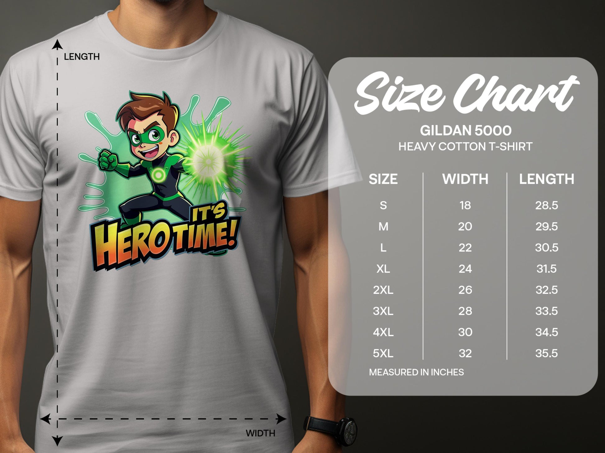 A person wears a vibrant white T-shirt by Garment Graphics, featuring a superhero graphic print with the text Its Hero Time! Next to them is a size chart for Gildan 5000 T-shirts, showing family sizing options from small to 5XL with width and length in inches.