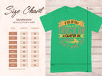 Green T-shirt by Garment Graphics featuring a humorous quote: If hes got golf clubs in his truck or a camper in his driveway, I dont hire him. Perfect for laughs. Includes a size chart for Gildan 5000 Heavy Cotton T-shirt, available from S to 5XL with sizing details.