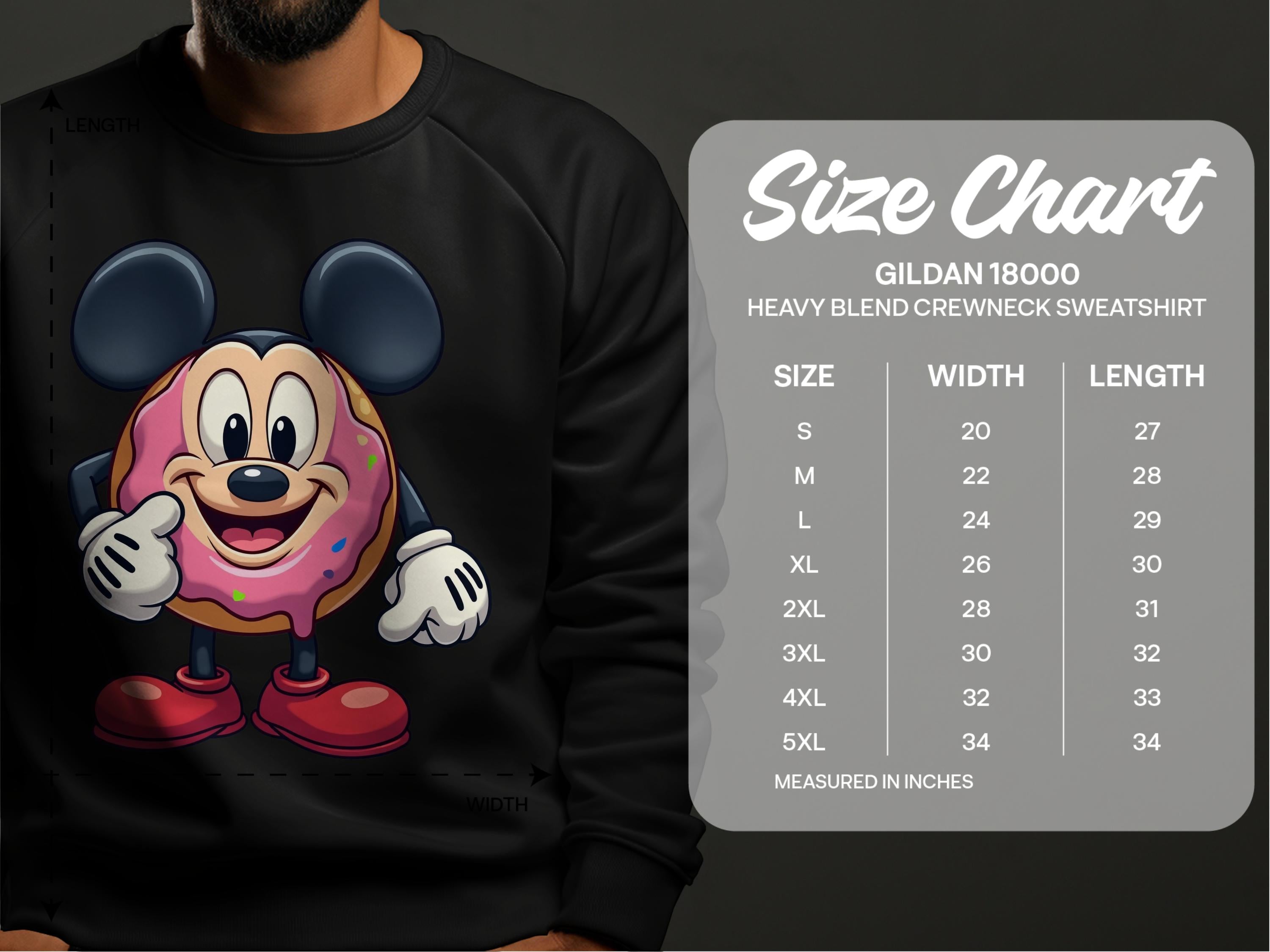 Someone sports a quirky black sweatshirt from Garment Graphics, adorned with a cute cartoon donut with mouse ears. Nearby, the Gildan 18000 size chart displays sizes S to 5XL and corresponding width and length in inches, ensuring this playful wardrobe piece fits everyone.