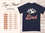 A navy Garment Graphics T-shirt features Soccer Dad alongside a soccer ball design. Includes Gildan 5000 size chart for heavy cotton tees from S to 5XL (widths and lengths in inches). Ideal for the soccer-loving dad!.