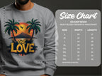 A person wears a gray Garment Graphics sweatshirt with a sunset and One Love text, standing beside a size chart. Unisex sizes range from S to 5XL, including detailed width and length measurements for One Love Sweatshirts.