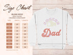 Garment Graphics size chart for the Gildan 18000 heavy blend Soccer Dad sweatshirt offers unisex sizing from S to 5XL, with dimensions in inches. This cozy crewneck ensures finding your perfect fit is a breeze.