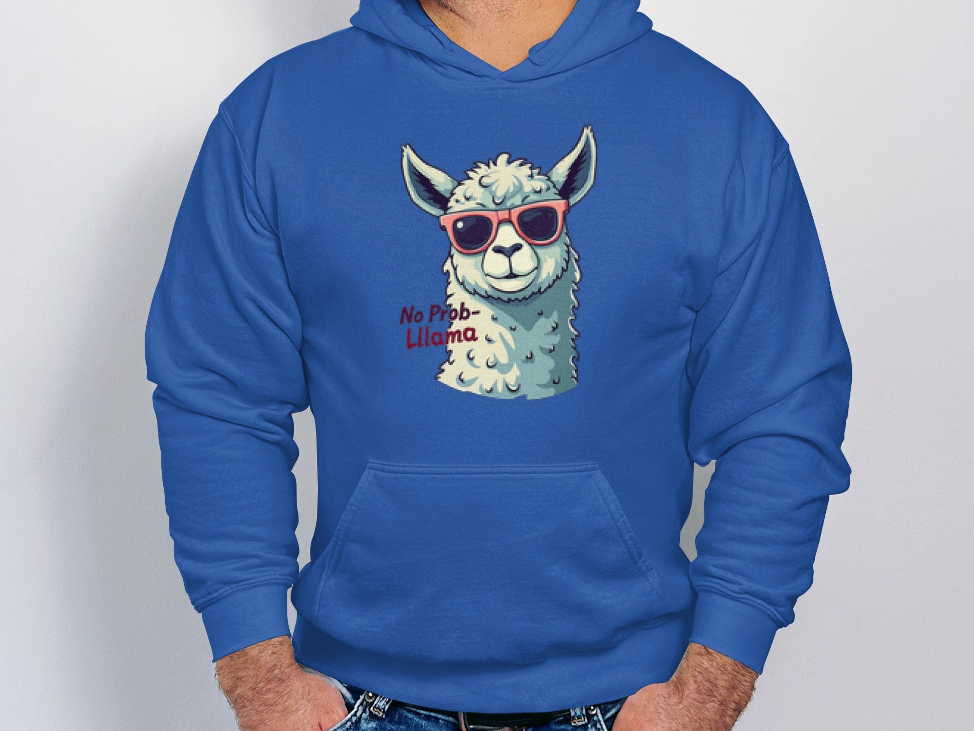 Sporting Garment Graphics unisex blue graphic hoodie with a llama in red sunglasses and the phrase No Prob-llama, this playful attire is perfect for casual outings, featuring a front pocket to rest your hands.