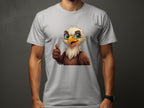 A person wearing a Garment Graphics T-shirt adds a fun casual vibe to any wardrobe with its cartoon eagle featuring large green eyes, a happy expression, and a thumbs-up gesture on a plain dark gray background.
