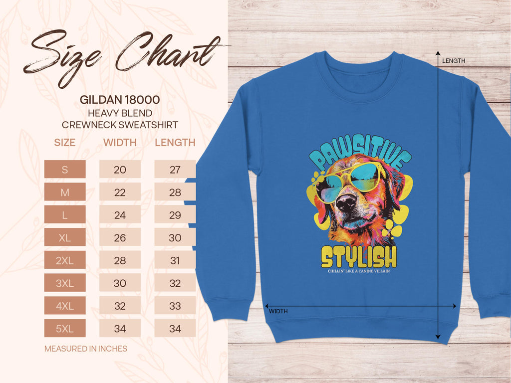 Dog enthusiasts will love this Garment Graphics blue crewneck sweatshirt with a vibrant dog in sunglasses. It features the text Pawsitive Stylish and a charming leaf background. A size chart, from S to 5XL, can be found on the left detailing dimensions in inches.