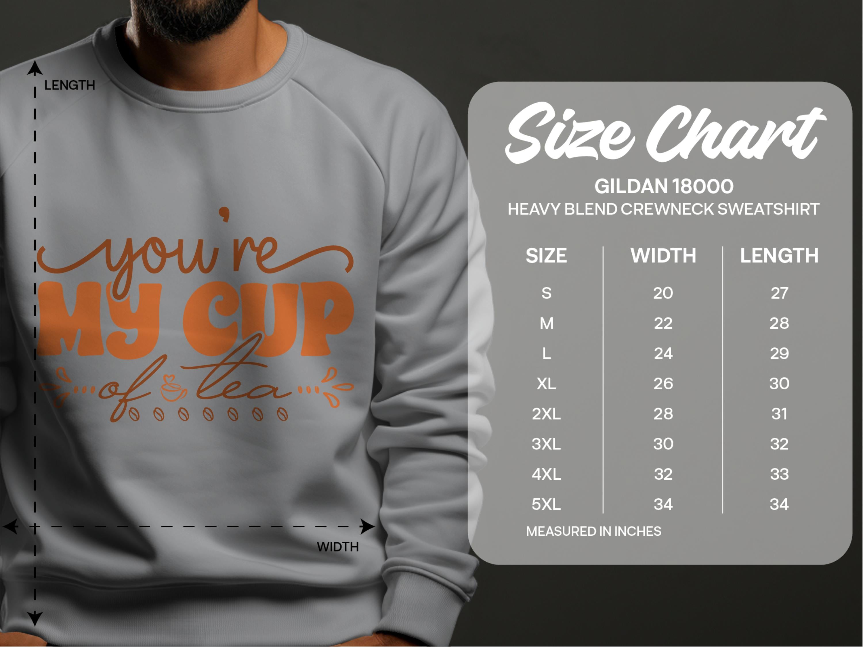 A man wears a gray Garment Graphics sweatshirt with Youre My Cup of Tea in orange. Next to him, a size chart lists the Gildan 18000 Heavy Blend Crewnecks cozy range from S to 5XL, showing width and length in inches.
