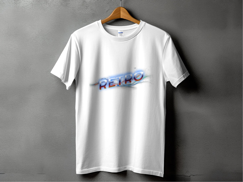 A white T-shirt by Garment Graphics hangs on a wooden hanger against a gray backdrop. It exudes vintage charm with RETRO in large, multi-colored letters across the chest, showcasing classic fit and retro graphic design.