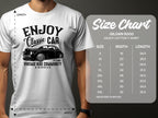 A person wears a Garment Graphics white tee with a car graphic and ENJOY Classic Car, Vintage Ride Community, Aircooled text—ideal for car fans. Its a Gildan 5000 heavy cotton available in sizes S to 5XL.