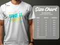 A person models a vibrant Garment Graphics Take It Easy T-shirt featuring colorful letters and musical notes, alongside the size chart for Gildan 5000 heavy cotton T-shirts, which includes sizes S to 5XL with width and length in inches.