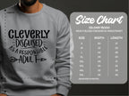 A person wears a Garment Graphics gray sweatshirt cleverly disguised as a responsible adult. This humor sweatshirt is made from medium-heavy fabric for comfort, features unisex sizing from S to 5XL, and includes detailed measurements for the Gildan 18000 model.