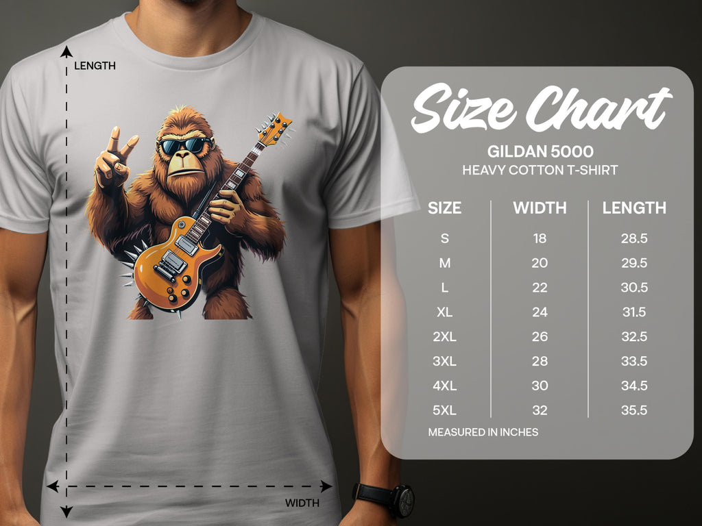 A music enthusiast dons a gray Garment Graphics t-shirt featuring a gorilla playing an electric guitar and giving a peace sign, next to the size chart for the Gildan 5000 heavy cotton tee, specifying dimensions from S to 5XL.