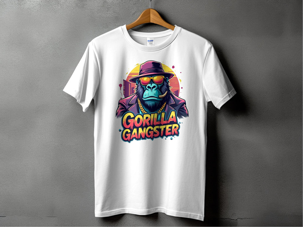 Garment Graphics Graphic T-Shirt features a bold gorilla in a hat and sunglasses with the text GORILLA GANGSTER on a plain background, making it eye-catching and vibrant.