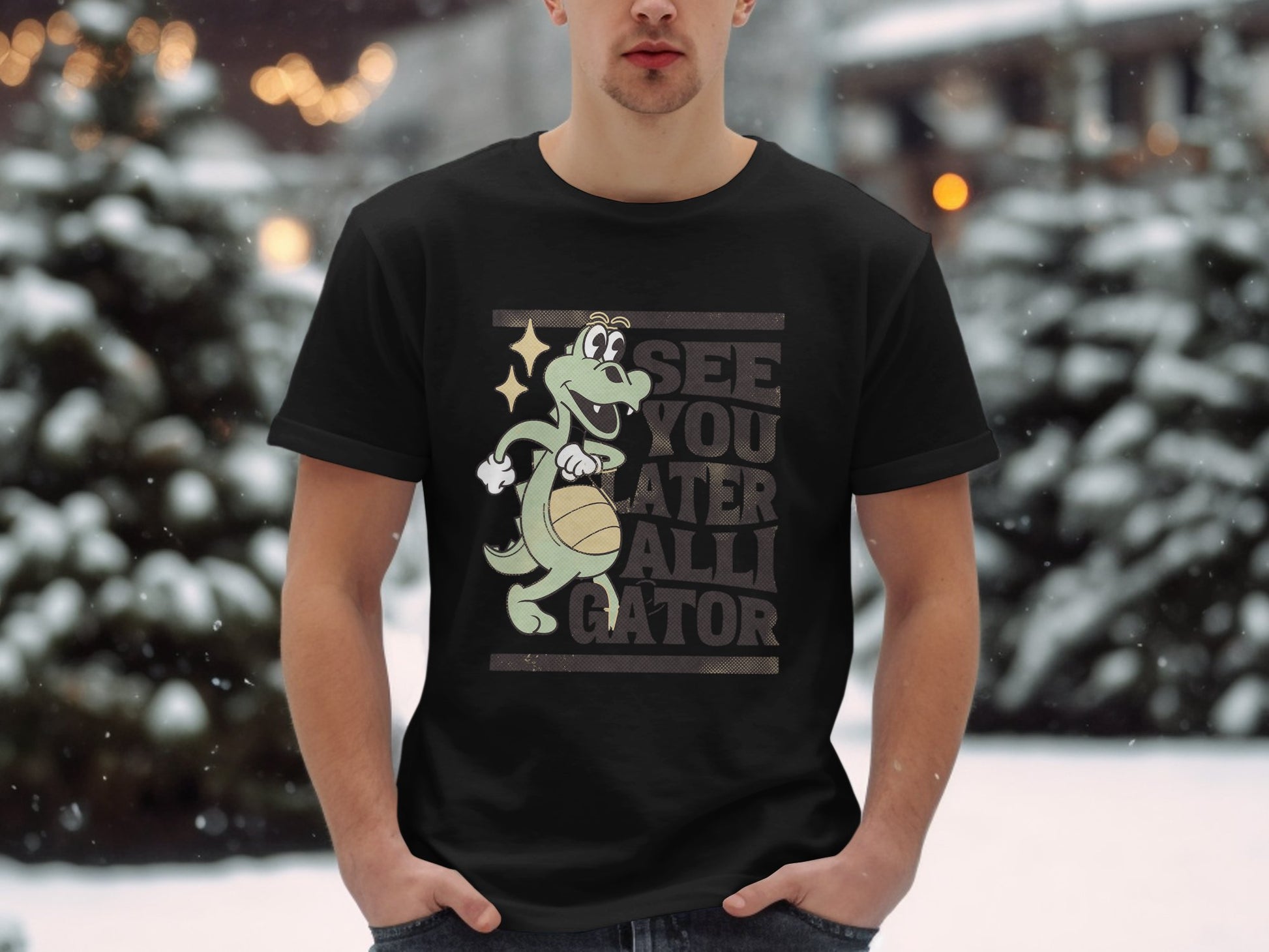 In the chilly outdoors, an individual sports a Garment Graphics casual black T-shirt with a grinning green alligator holding a basketball. It proudly showcases See You Later Alligator, merging style and playfulness for any casual occasion.